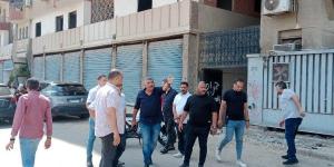 تنفيذ حملة مكبرة لرفع الإشغالات والانضباط العام للشوارع في الدقي - لايف نيوز